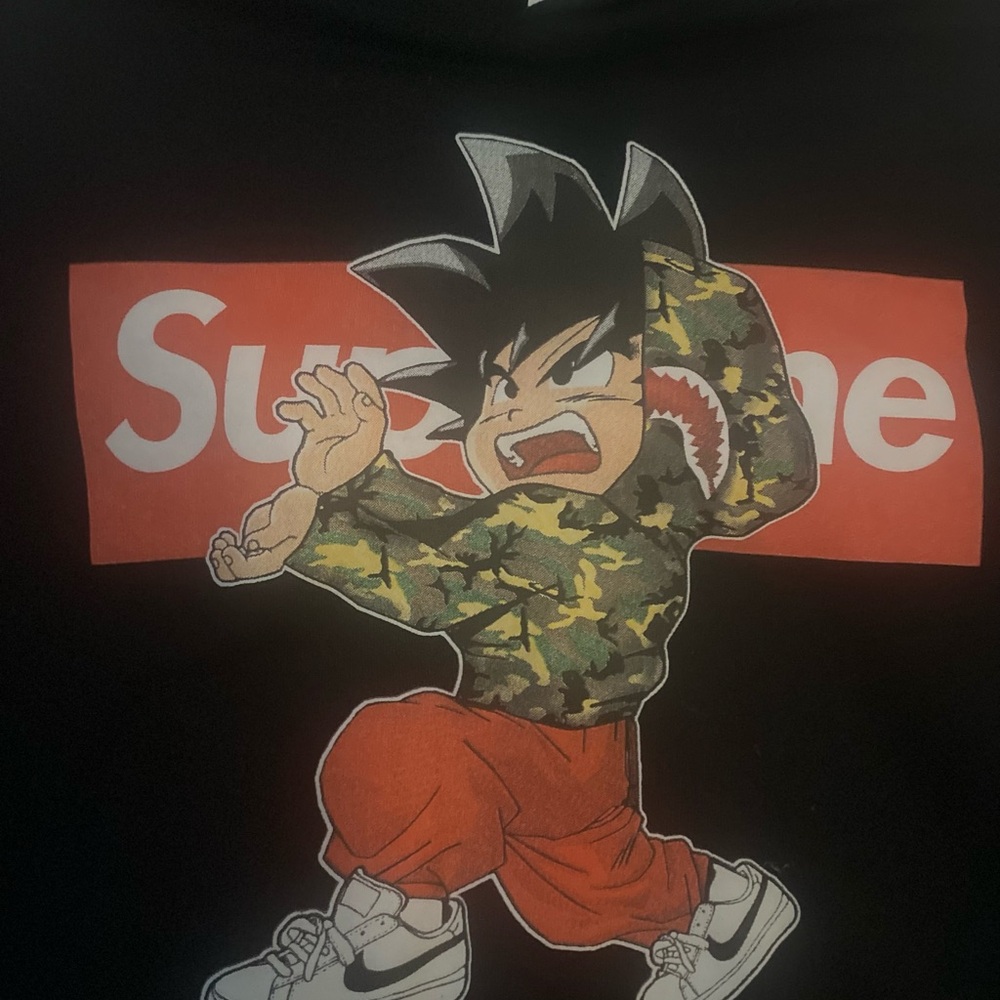 Supreme Black Jacket with Camouflage and Red Accents